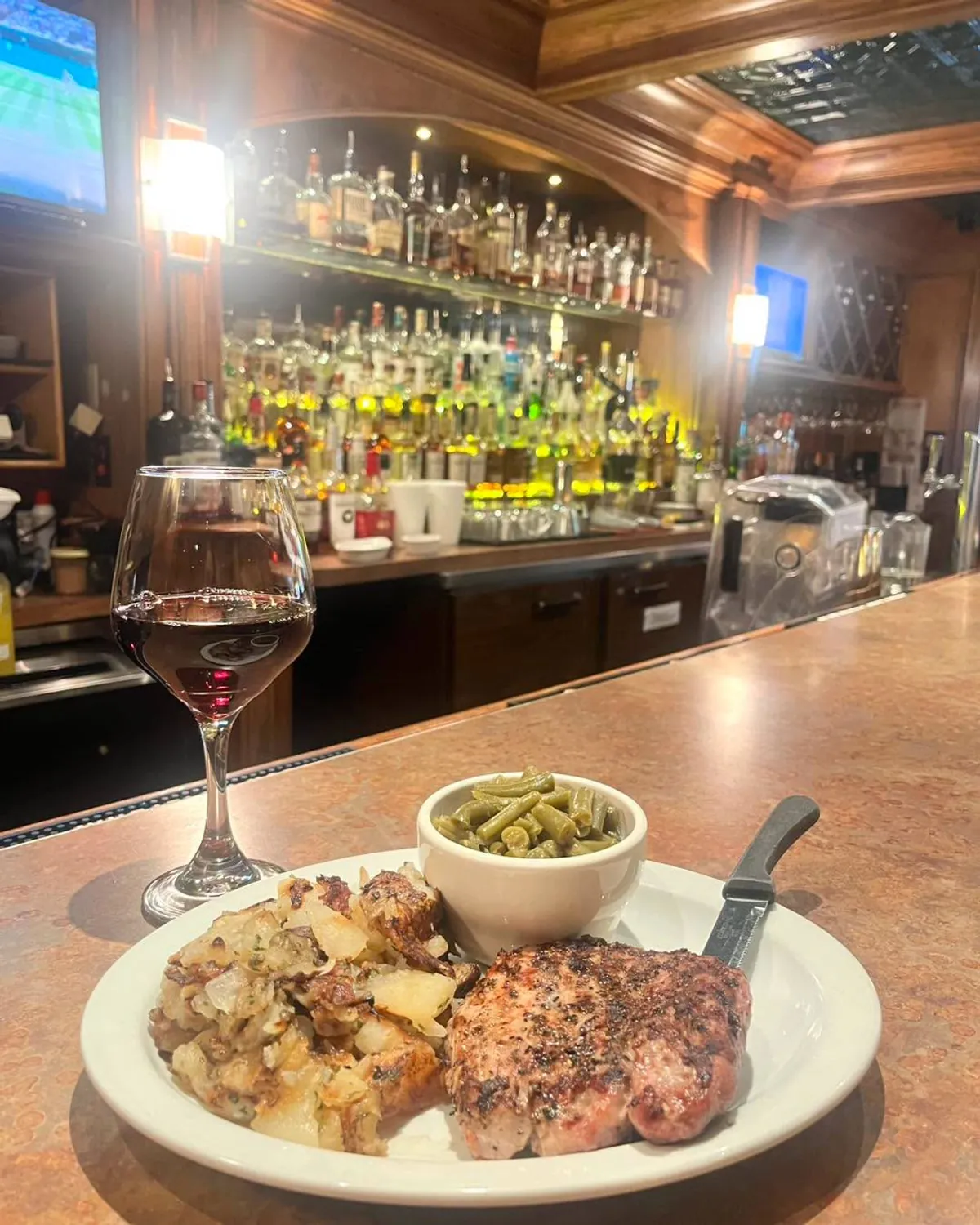 Grilled pork chop plate served at the Fireside bar